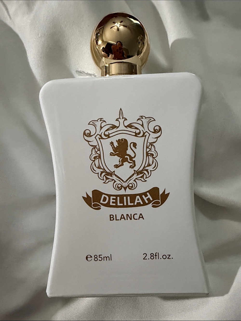 Delilah Wear Blanca Body Oil — White & Gold Luxe Bottle